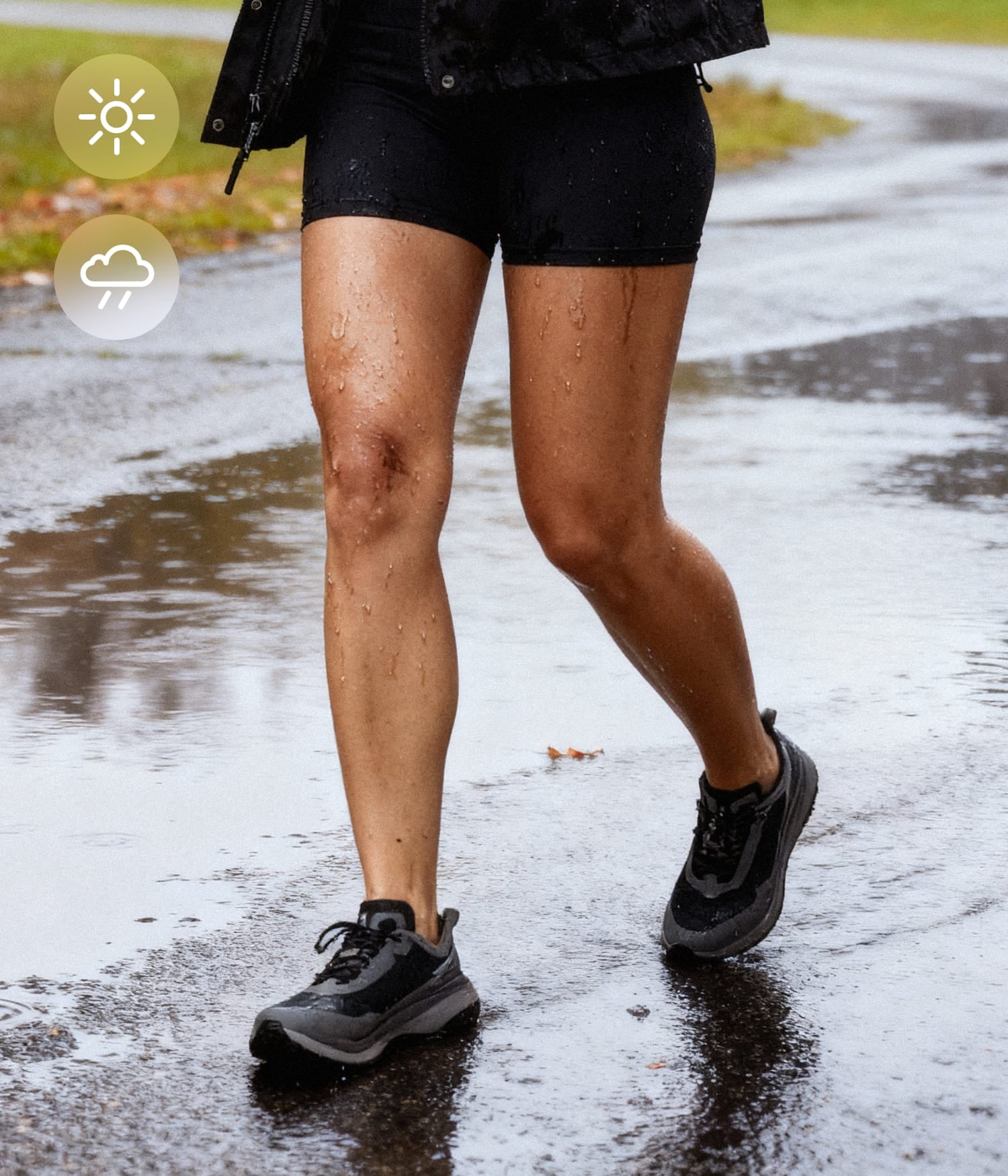Water-resistant Si-14 lightweight walking shoes worn on a wet path, suitable for light rain or damp conditions.