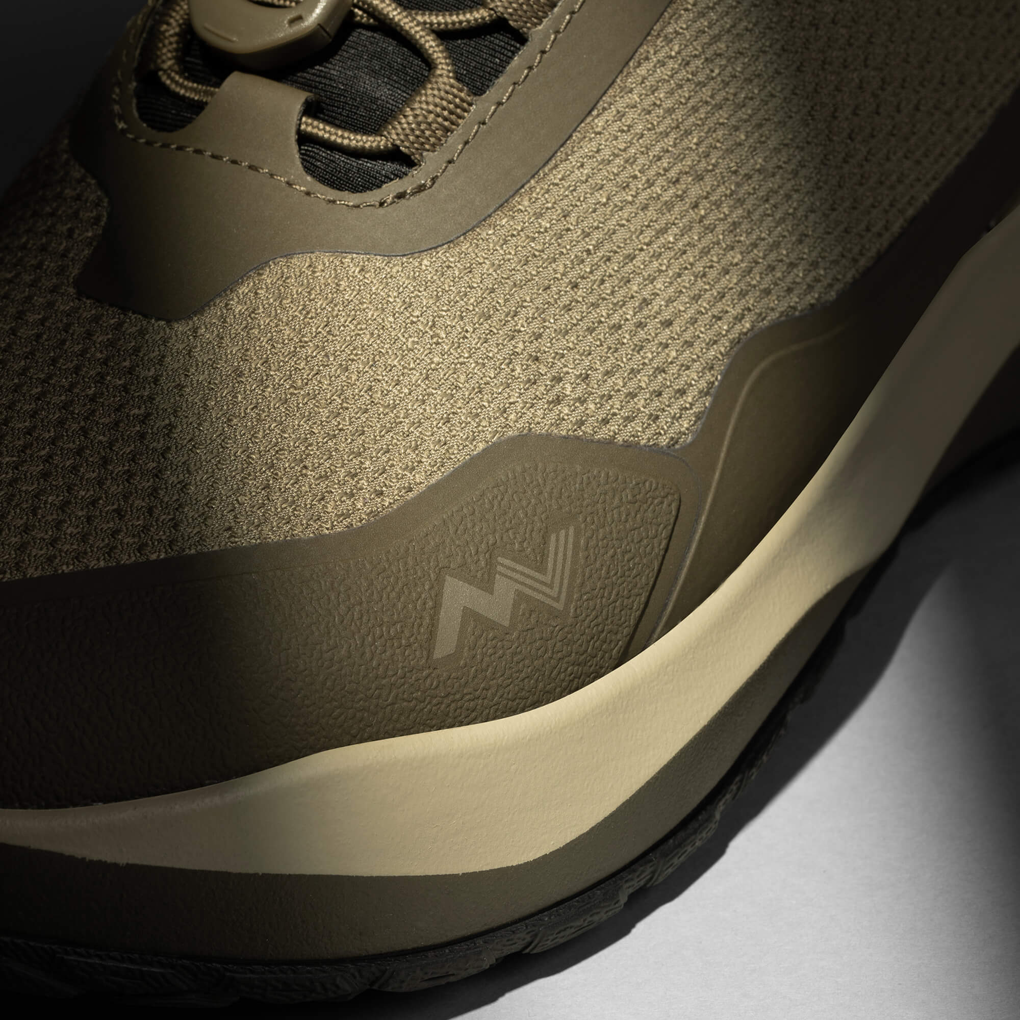 MUDDY VIBE Zn-30 mid-top Alpine Green hiking shoe with tonal green and beige accents, icon view on a soft shadow background.