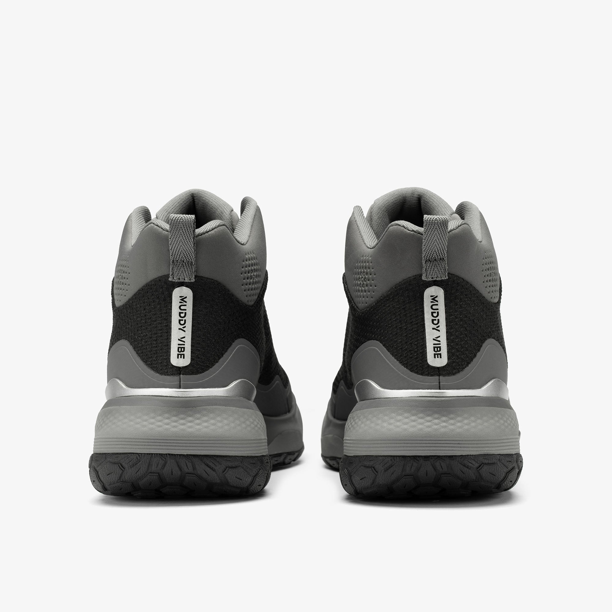 MUDDY VIBE Zn-30 Cliff Grey mid-top hiking shoe with black and white accents, rear view on a white background.