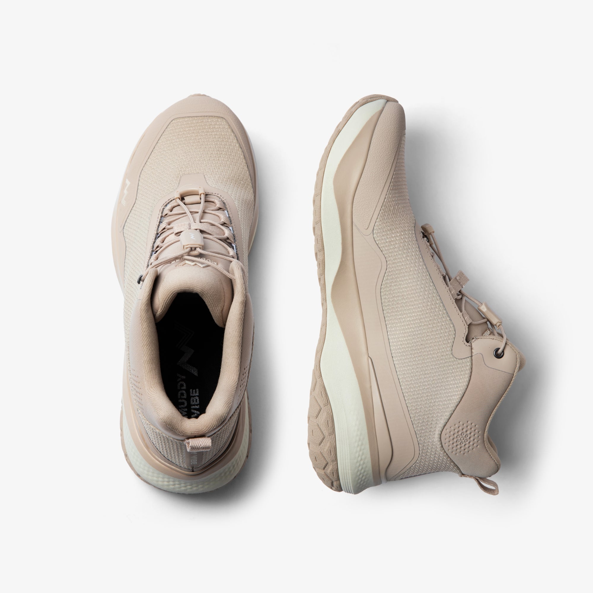 MUDDY VIBE Zn-30 Desert Sand mid-top hiking shoe with light beige and off-white accents, top view on a white background.