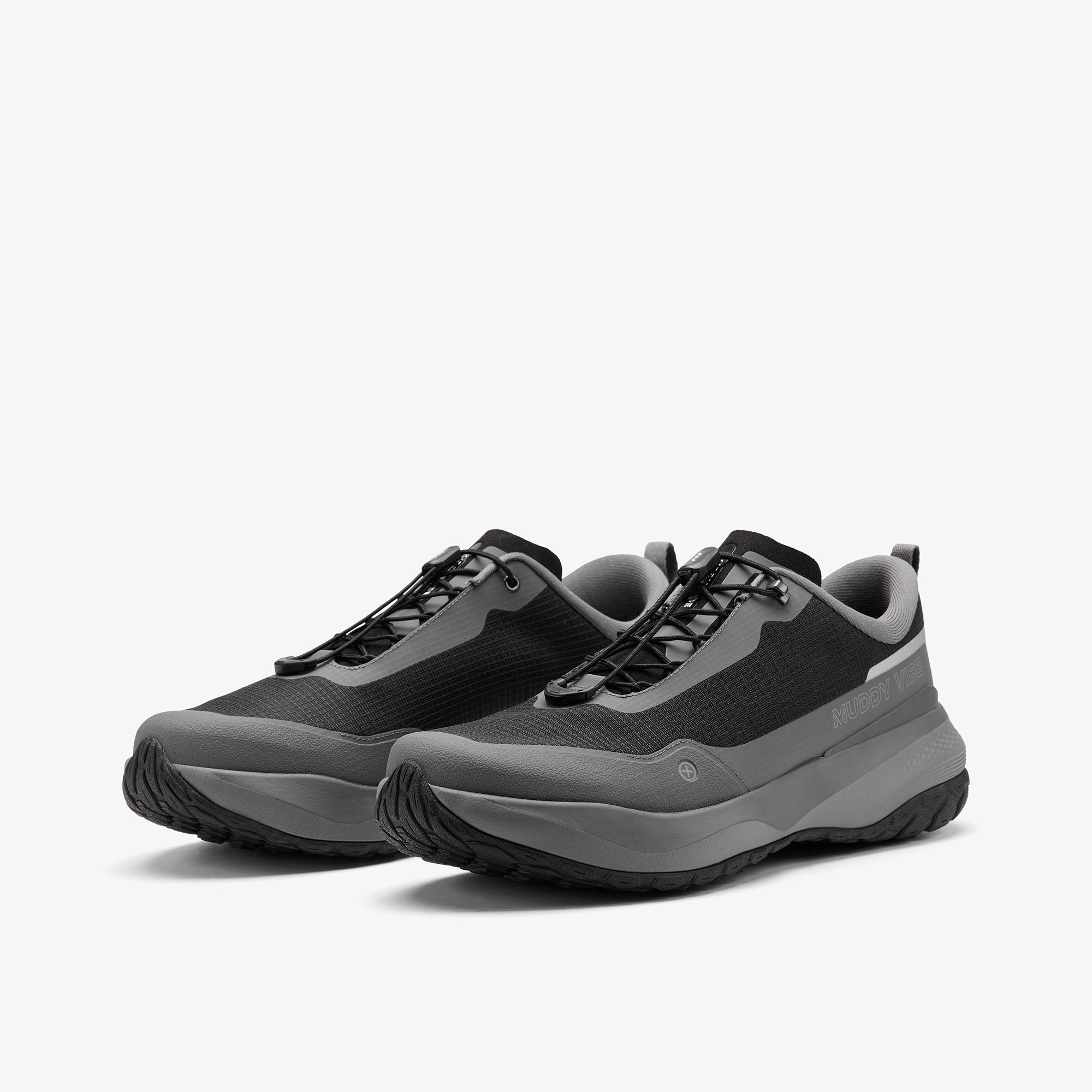 MUDDY VIBE Si-14 Tide Rock low-top hiking shoe with black and grey accents, 45 degree side view on a white background.
